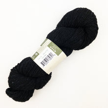 Load image into Gallery viewer, A black skein of Queensland Kathamandu Aran tweed yarn