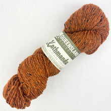 Load image into Gallery viewer, An orange skein of Queensland Kathamandu Aran tweed yarn