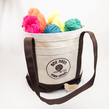 Load image into Gallery viewer, Canvas Tote with Bay Area Yarn Crawl logo full of colorful yarn