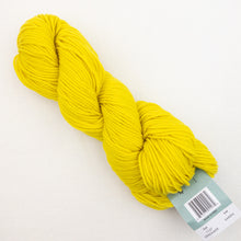 Load image into Gallery viewer, A skein of neon yellow Plymouth DK Merino Superwash yarn on a white background.