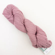 Load image into Gallery viewer, A skein of dusty pink Plymouth DK Merino Superwash yarn on a white background.