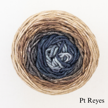 Load image into Gallery viewer, A tan and grey ball of Freia Merino Silk Worsted ombre yarn