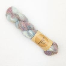 Load image into Gallery viewer, Multicolored skein of Lavender Fiber Co Baby Suri yarn