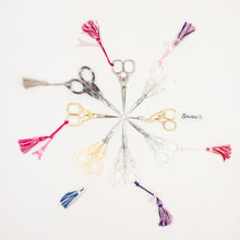 Load image into Gallery viewer, Six pairs of Sajou Scissors arranged in a circle on a white background