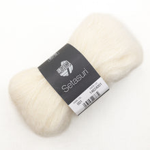 Load image into Gallery viewer, White yarn ball with a Lana Grossa Setasuri label on a white background