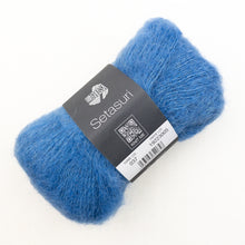 Load image into Gallery viewer, Blue yarn ball with a Lana Grossa Setasuri label on a white background