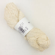 Load image into Gallery viewer, A cream skein of BC Garn Soft Silk yarn on a white background.