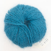 Load image into Gallery viewer, A ball of teal Plymouth Angora yarn on a white background.
