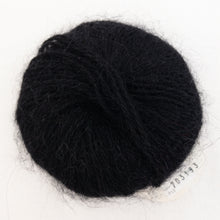 Load image into Gallery viewer, A ball of black Plymouth Angora yarn on a white background.
