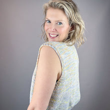 Load image into Gallery viewer, Woman wearing a sleeveless patterned top against a gray background
