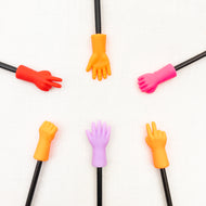 Colorful knitting needle point protectors in the shapes of hands