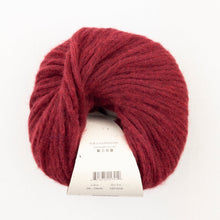 Load image into Gallery viewer, A skein of red Beatrix yarn in color Claret

