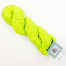 Load image into Gallery viewer, A skein of lime green Plymouth DK Merino Superwash yarn on a white background.
