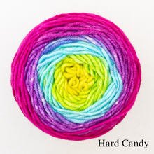 Load image into Gallery viewer, A rainbow ball of Freia Merino Silk Worsted ombre yarn 
