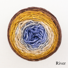 Load image into Gallery viewer, A blue and brown ball of Freia Merino Silk Worsted ombre yarn 
