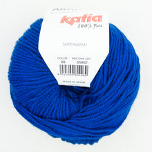 Load image into Gallery viewer, A ball of bright blue Katia Merino Aran yarn in color 99 Ultramarine Blue
