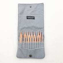 Load image into Gallery viewer, Atelier Yarns Rose gold Interchangeable Knitting Needles in a Grey case.
