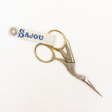 Load image into Gallery viewer, a pair of Gold Stork Sajou Scissors on a white background
