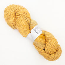 Load image into Gallery viewer, A yellow skein Lorna's Laces Shepherd Bulky yarn on a white background
