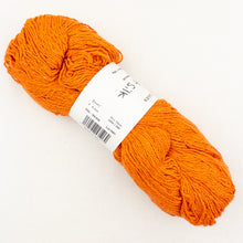 Load image into Gallery viewer, An orange skein of BC Garn Soft Silk yarn on a white background.
