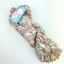Load image into Gallery viewer, A multicolor skein of Knit Collage Cast Away yarn.
