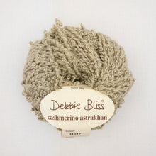 Load image into Gallery viewer, A beige ball of Debbie Bliss Astrakhan yarn on a white background
